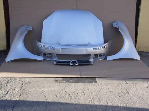 VW Golf 7 VII 5G 12-16r lewy błotnik srebrny LA7W