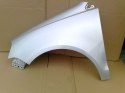 VW Polo 9N3 06-09r lewy błotnik srebrny LA7W