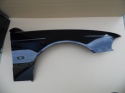 BMW 5 E39 96-04r. błotnik prawy w kolorze czarnym 668