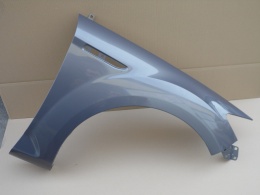 Ford Mondeo IV BA7 07-15r błotnik prawy srebrny H8 8PSC