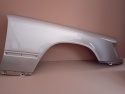 Mercedes E-Klasa W124 84-96r. błotnik prawy srebrny 702