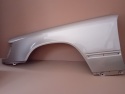 Mercedes E-Klasa W124 84-96r. błotnik lewy srebrny 702