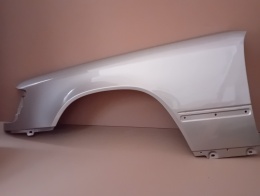 Mercedes E-Klasa W124 84-96r. błotnik lewy srebrny 702