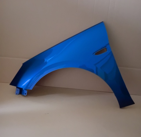 Opel Astra 5 K 15-22r lewy błotnik niebieski 23A