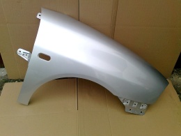 Seat Ibiza Cordoba 6L 02-08r prawy błotnik srebrny LS7Y