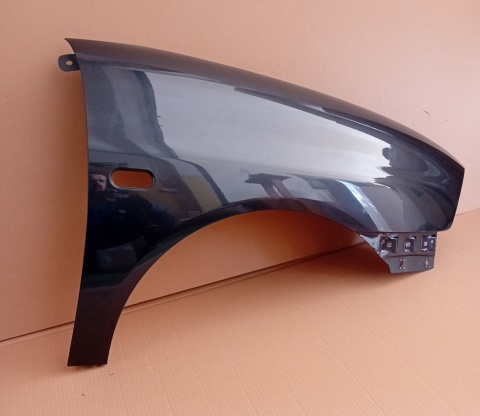 Seat Ibiza Cordoba 6L 02-08r prawy błotnik szary LS7Z