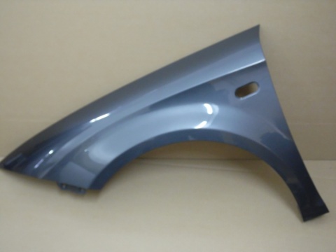 Seat Leon 1P 05-12r lewy błotnik szary metalik LS7Z