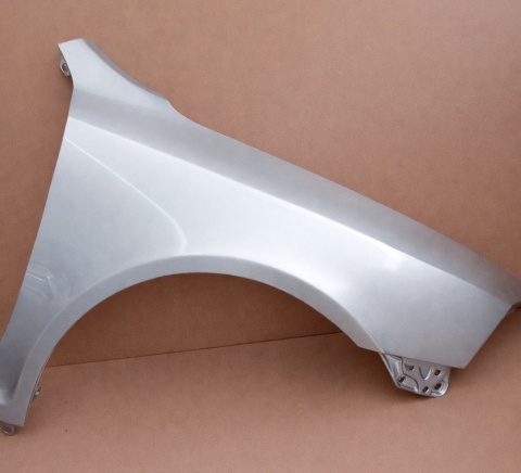 Skoda Octavia 2 II 1Z 04-08r prawy błotnik srebrny 9102