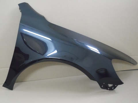 Skoda Octavia 2 II 1Z 09-13r prawy błotnik czarny 9910