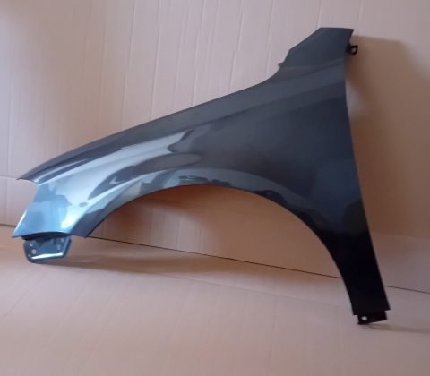 VW Passat B7 10-14r lewy błotnik brązowy LB8R