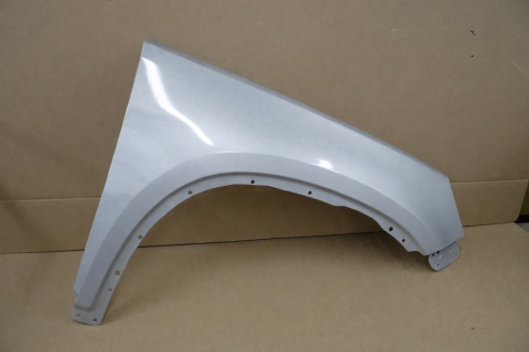 VW Tiguan 5N 07-16 prawy błotnik srebrny LA7W