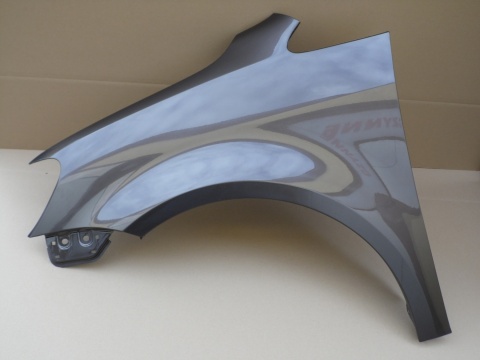 VW Touran 1T3 11-15r lewy błotnik brązowy LH8Z