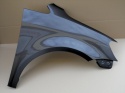VW Touran 1T3 11-15r prawy błotnik szary LI7F